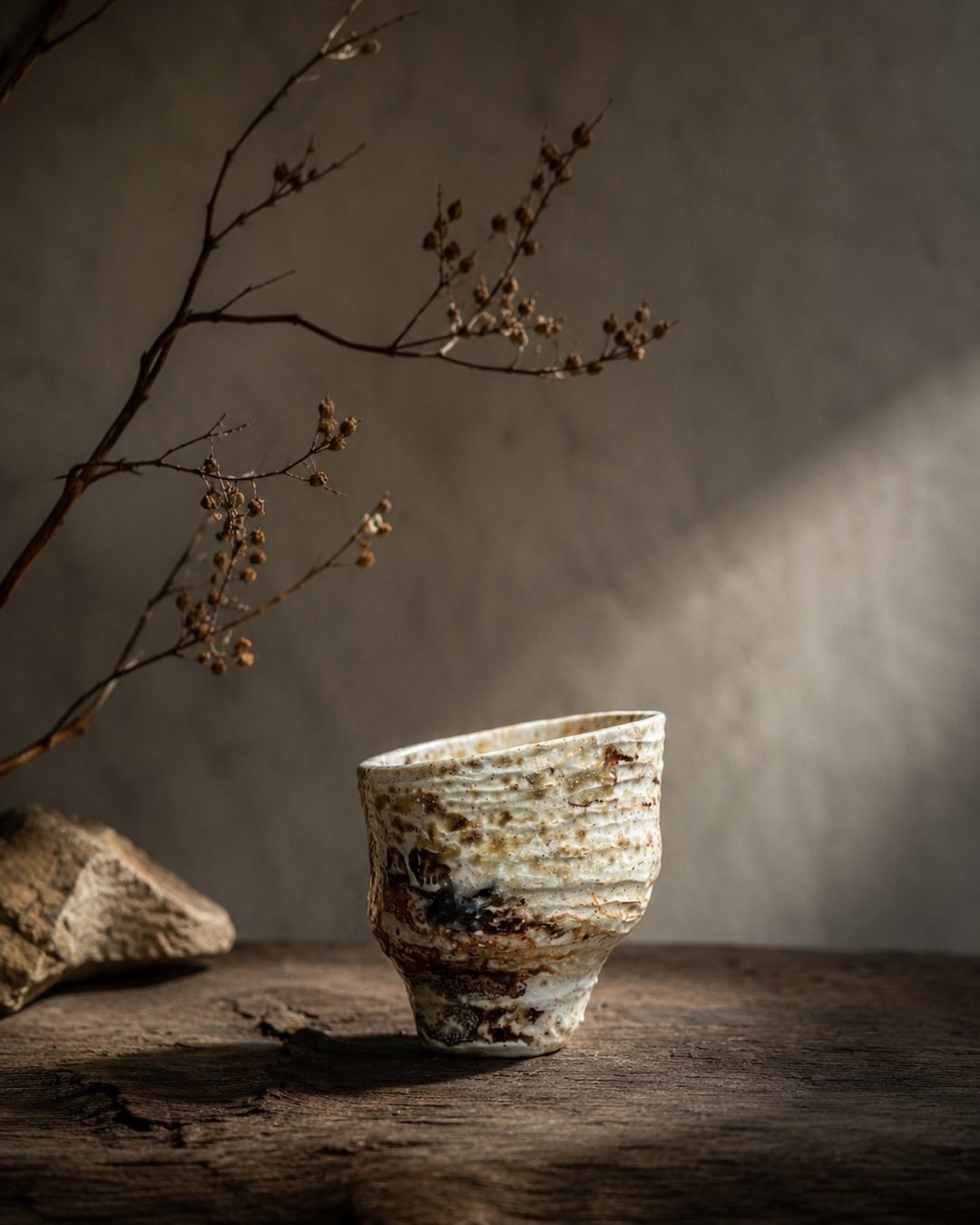 Ceramic piece surrounded by fire and embers